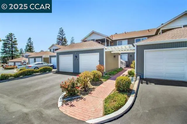 front view of a house with a small yard