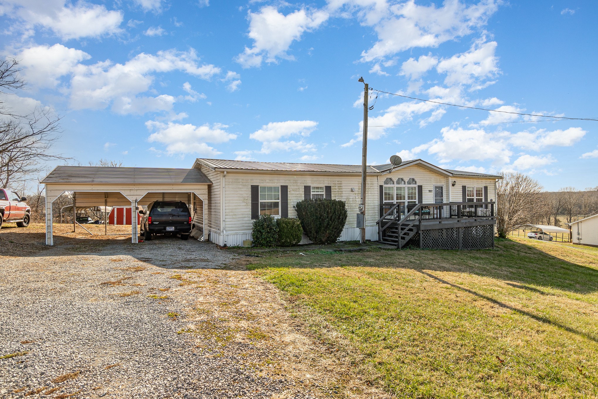 7801 Bob Carr Road Cross Plains, TN 37049 - Photo 3 of 38 a front view of a house with garden