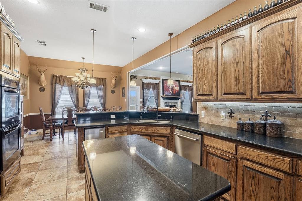 7229 County Road 1205 Rio Vista, TX 76093 - Photo 8 of 40 a kitchen with lots of counter top space