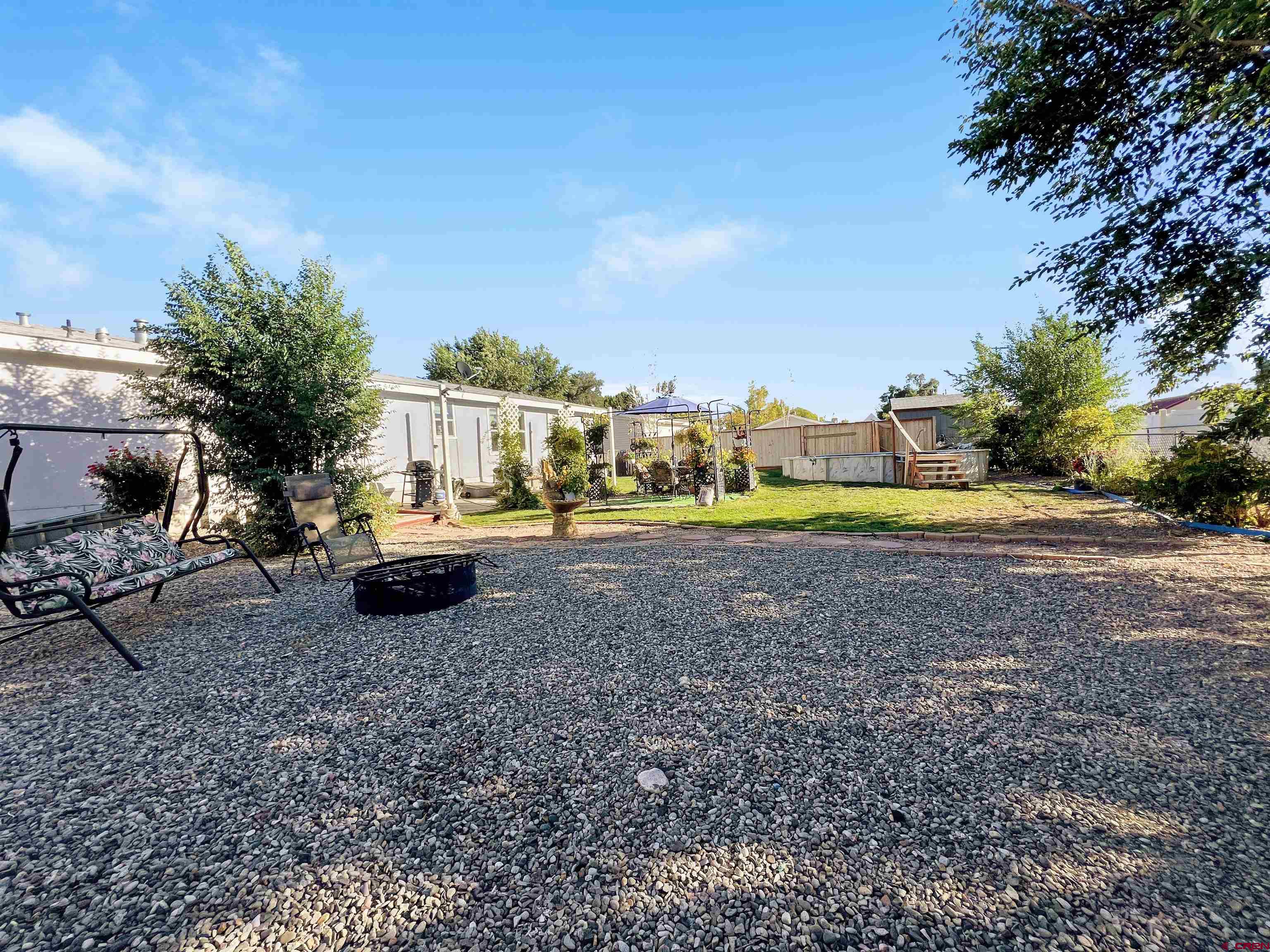 635 Fox Court Delta, CO 81416 - Photo 18 of 22 a view of a yard with a house