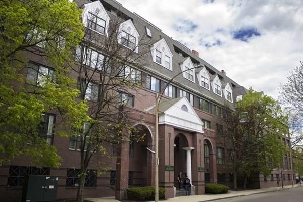 a view of a building with a street