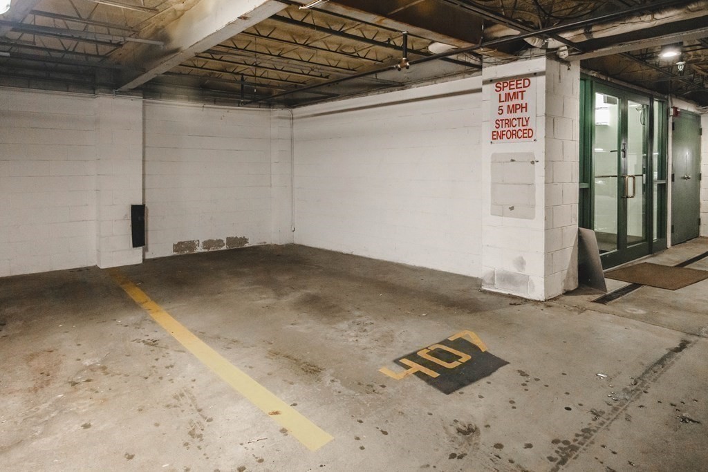 59 Brainerd Road, Unit 407 Boston, MA 02134 - Photo 21 of 22 a view of a room with wooden floor
