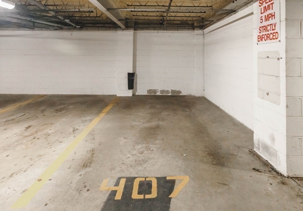 59 Brainerd Road, Unit 407 Boston, MA 02134 - Photo 22 of 22 a view of a garage