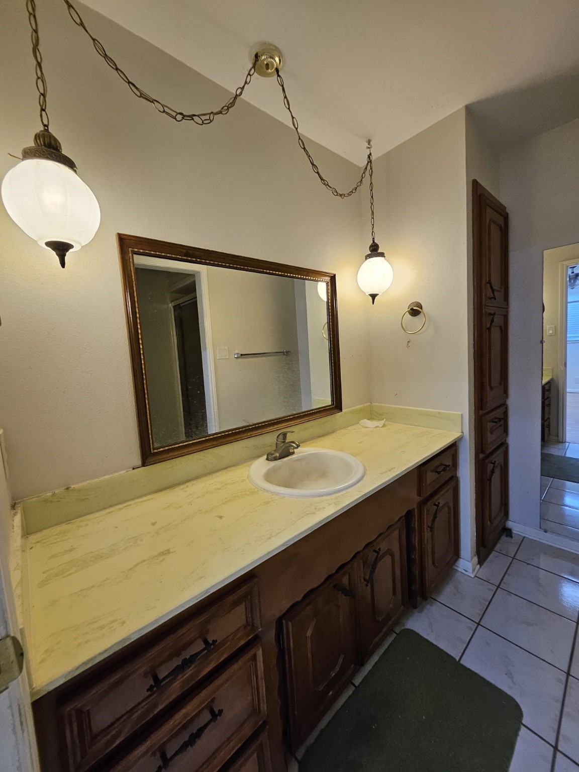 9415 Spellman Road Houston, TX 77031 - Photo 18 of 26 a bathroom with a sink and a mirror
