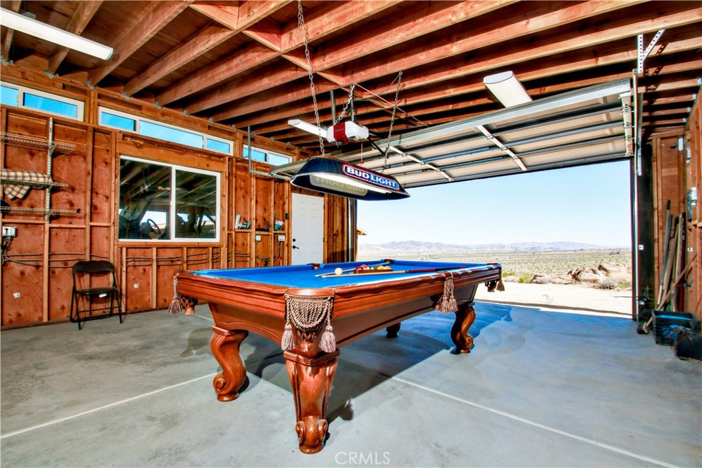 4650 Sizer Canyon Road Johnson Valley, CA 92285 - Photo 24 of 36 a room with table tennis pool table and stairs
