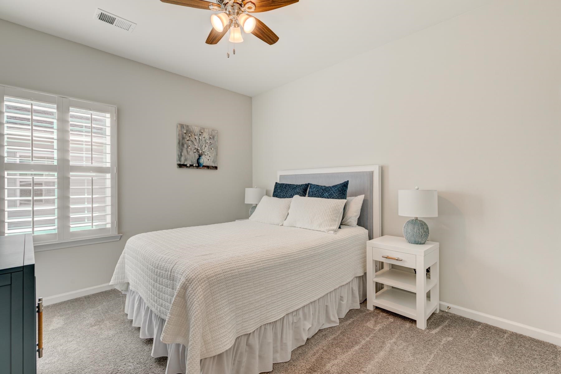 417 Heathside Street Murrells Inlet, SC 29576 - Photo 26 of 40 Bedroom with light carpet and a ceiling fan