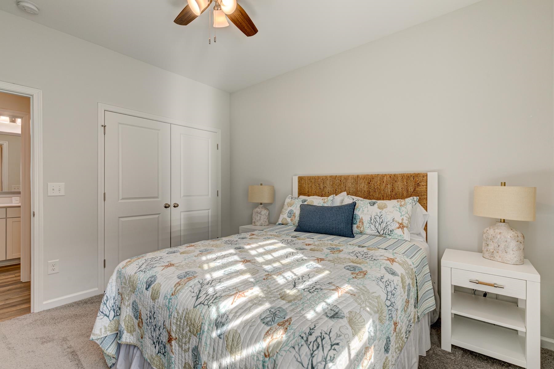 417 Heathside Street Murrells Inlet, SC 29576 - Photo 32 of 40 Bedroom featuring carpet, a closet, and a ceiling fan