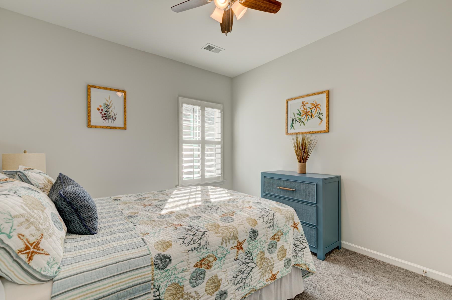 417 Heathside Street Murrells Inlet, SC 29576 - Photo 33 of 40 Bedroom with carpet and a ceiling fan
