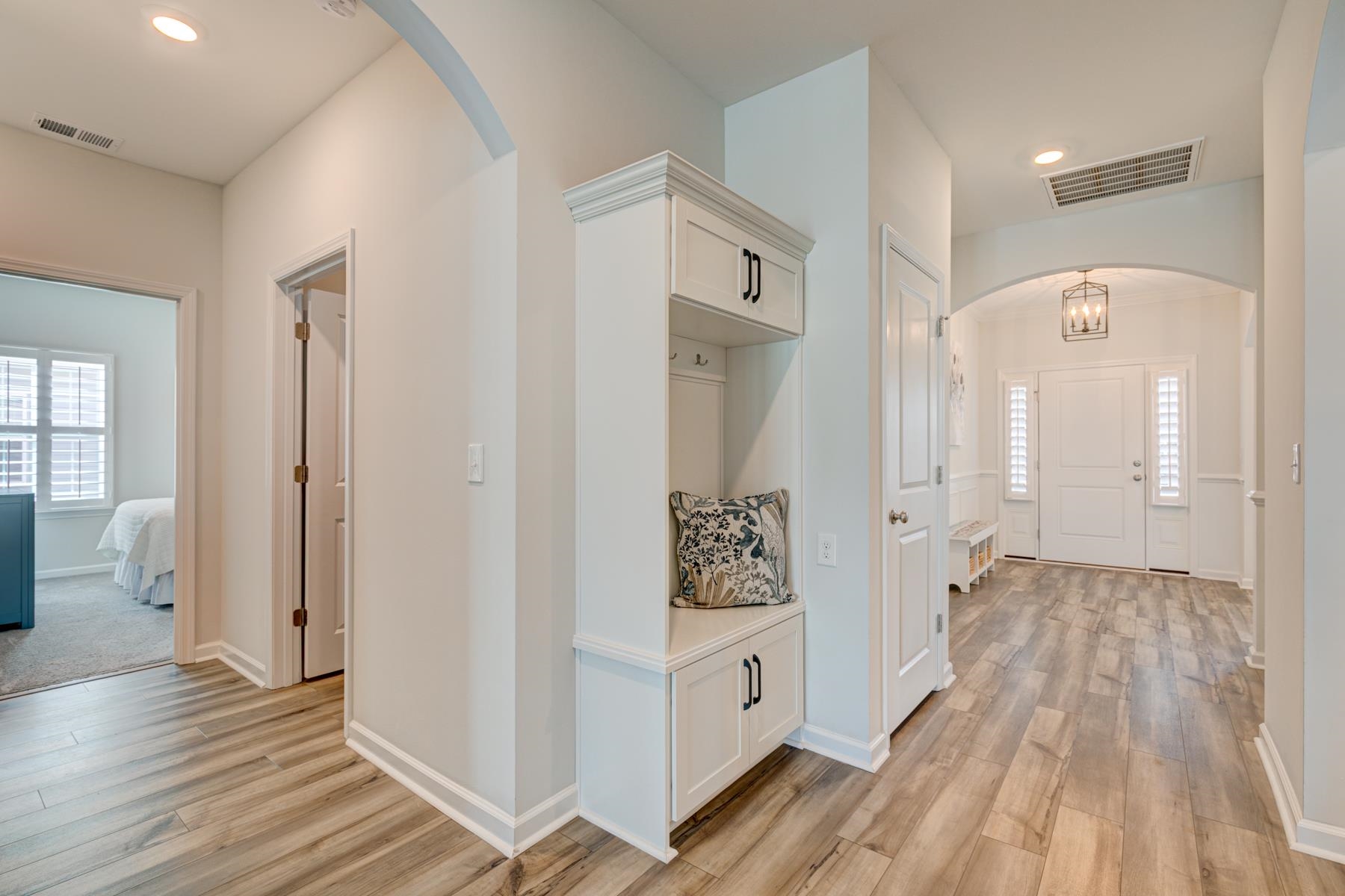 417 Heathside Street Murrells Inlet, SC 29576 - Photo 7 of 40 Mudroom with arched walkways, light wood-style flooring, and recessed lighting