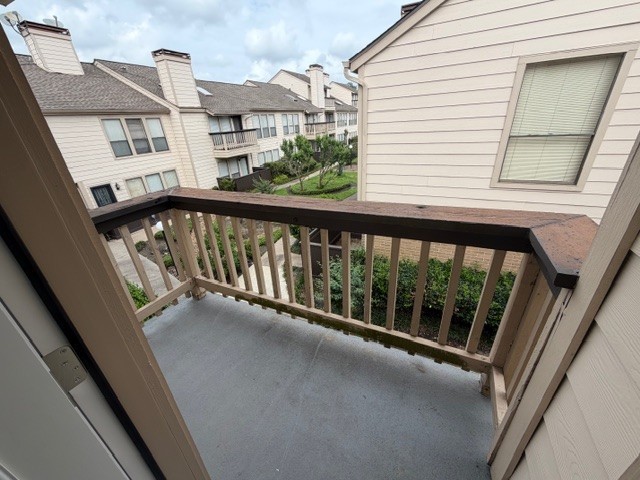 2277 South Kirkwood Road, Unit 104 Houston, TX 77077 - Photo 7 of 12 a view of balcony with a potted plant