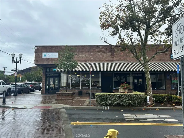 a front view of a building with porch