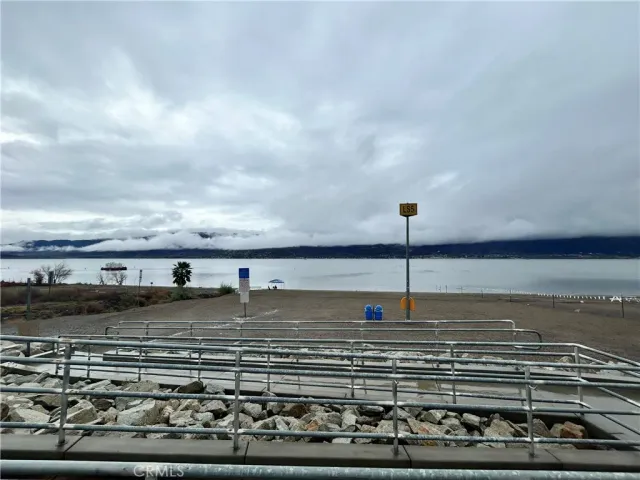 a view of swimming pool with outdoor seating