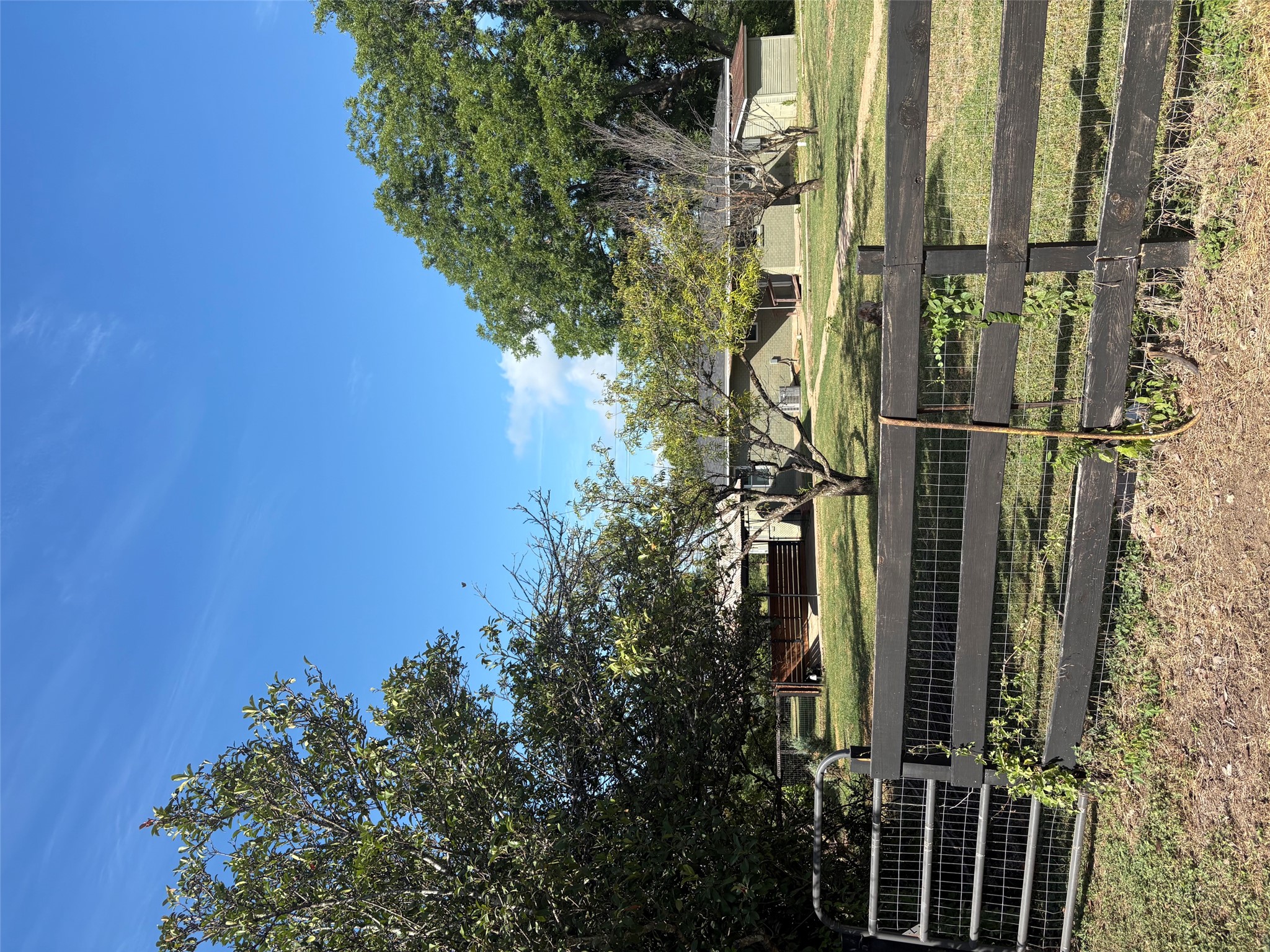 9032 Nuckols Crossing Road Austin, TX 78744 - Photo 14 of 14 A expansive backyard for your fur friends, chickens, gardens, etc.... awaits you.