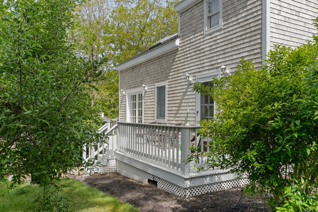 4 Hye Lane Edgartown, MA 02539 - Photo 38 of 41 a view of a house with a yard and deck