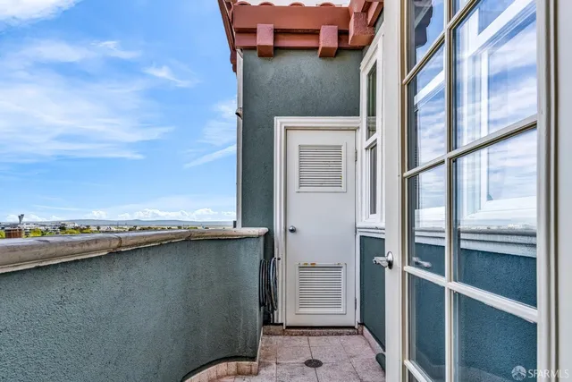 a bathroom with a granite countertop bathtub shower sink and mirror