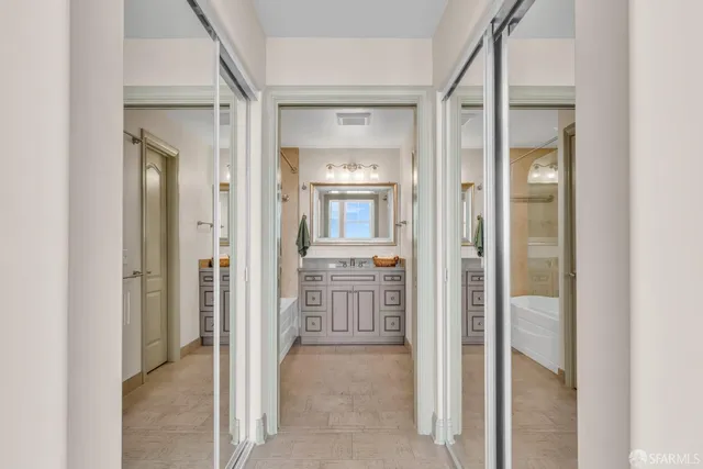 a view of an entryway with wooden floor