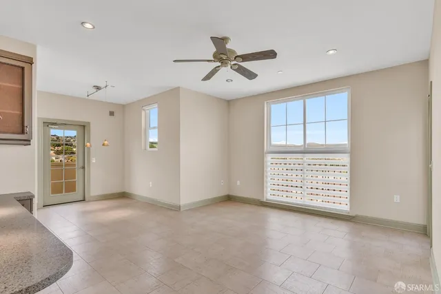 a view of a kitchen with a sink and cabinet area