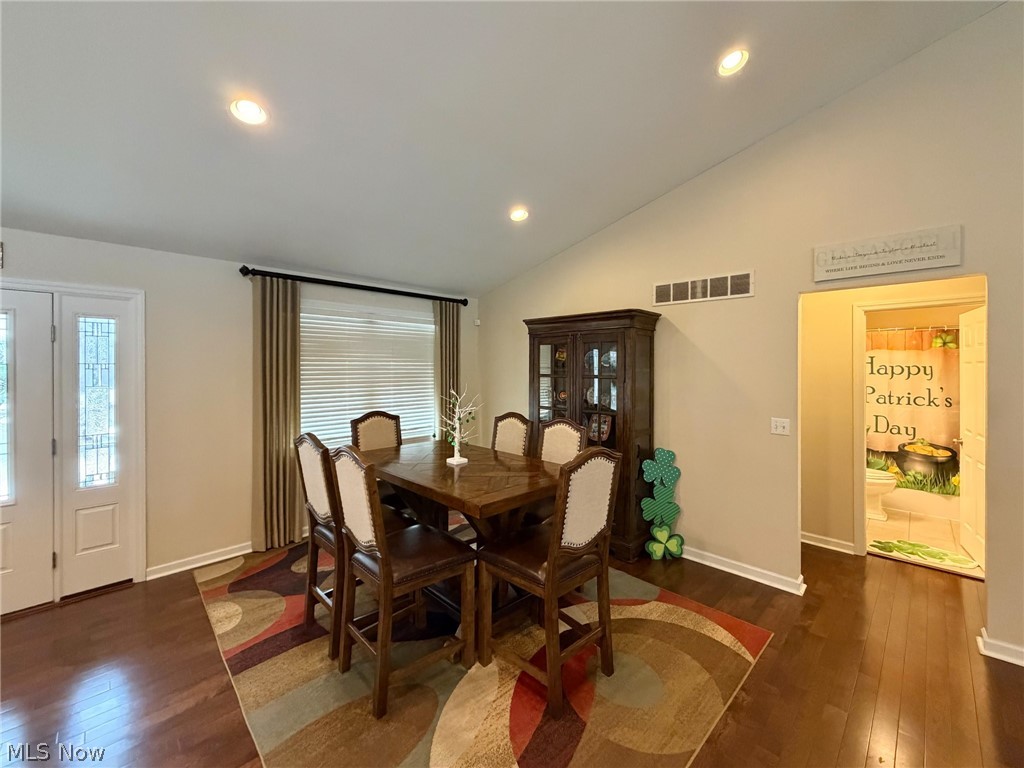 1343 Courtland Road Weirton, WV 26062 - Photo 18 of 50 Dining room featuring dark wood-style flooring, recessed lighting, and vaulted ceiling
