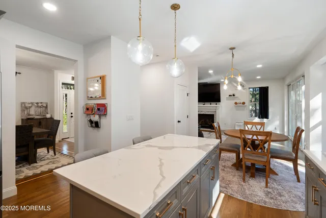 a kitchen with a table and chairs in it