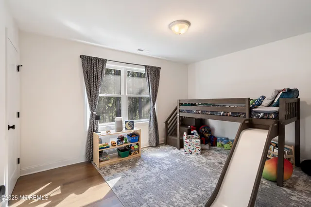 a view of room with furniture and a window