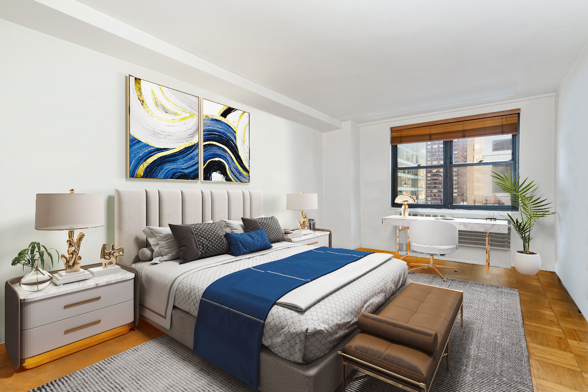 235 East 57th Street, Unit 11C Manhattan, NY 10022 - Photo 4 of 10 a bedroom with a bed and a couch