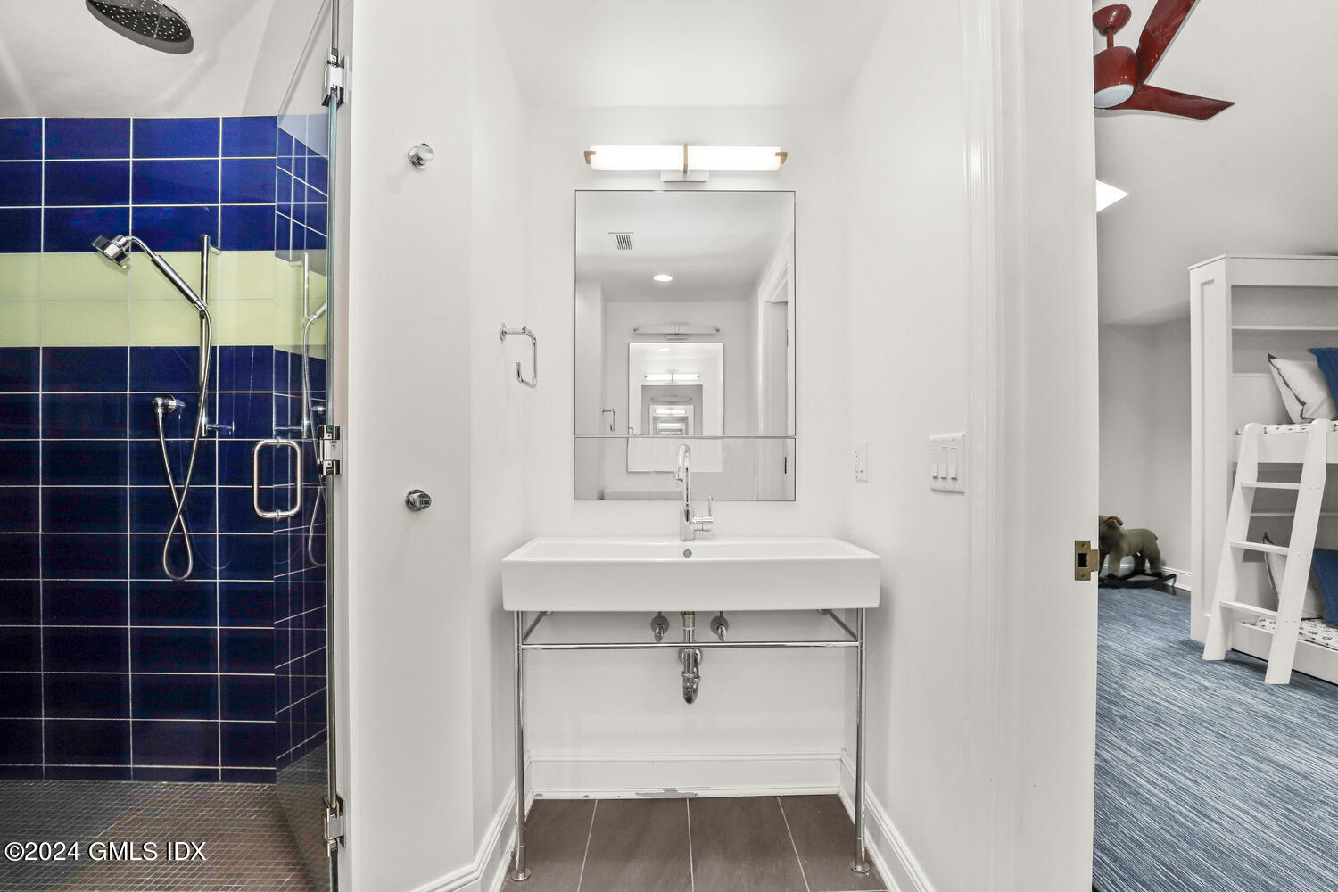 2 Lauder Way Greenwich, CT 06830 - Photo 13 of 25 a bathroom with a sink a toilet and shower