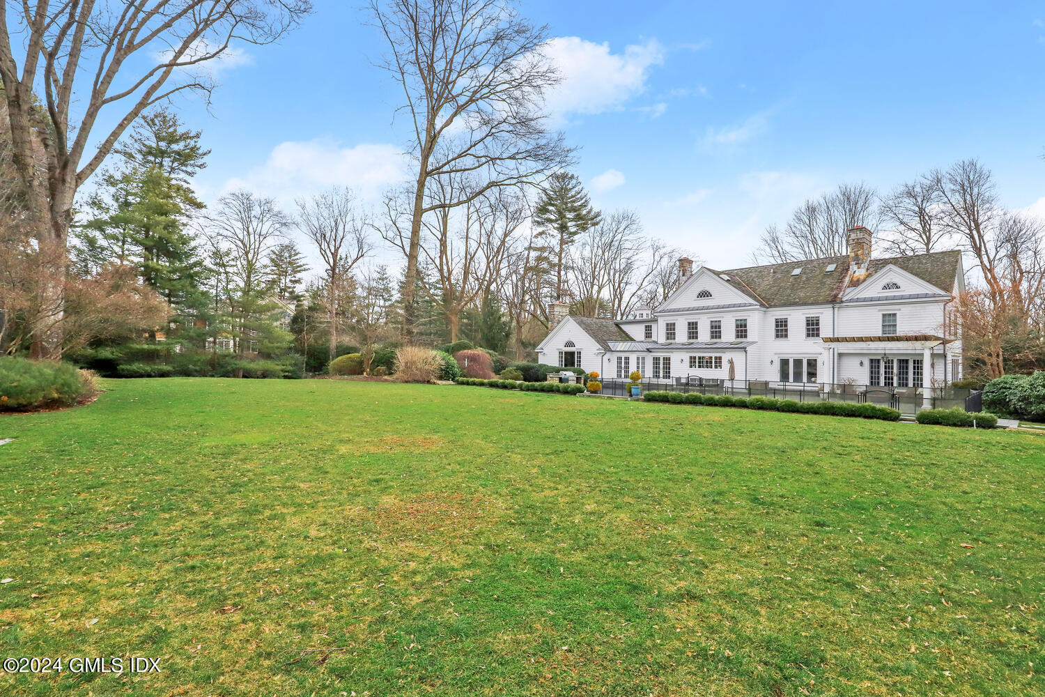 2 Lauder Way Greenwich, CT 06830 - Photo 14 of 25 a view of a house with a big yard