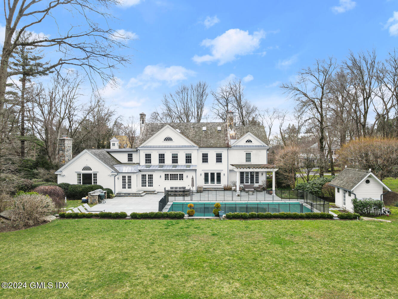 2 Lauder Way Greenwich, CT 06830 - Photo 17 of 25 front view of a house with a yard