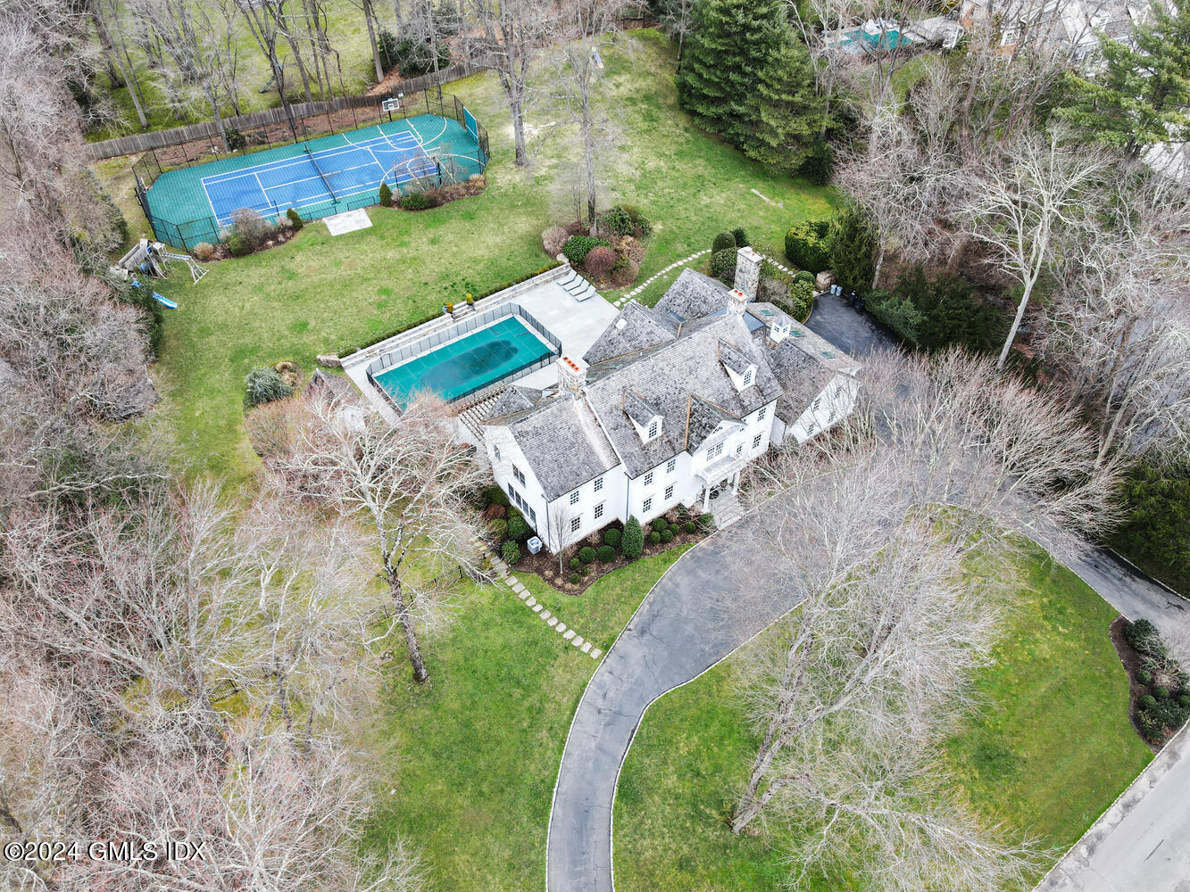 2 Lauder Way Greenwich, CT 06830 - Photo 18 of 25 a view of a yard with an outdoor space