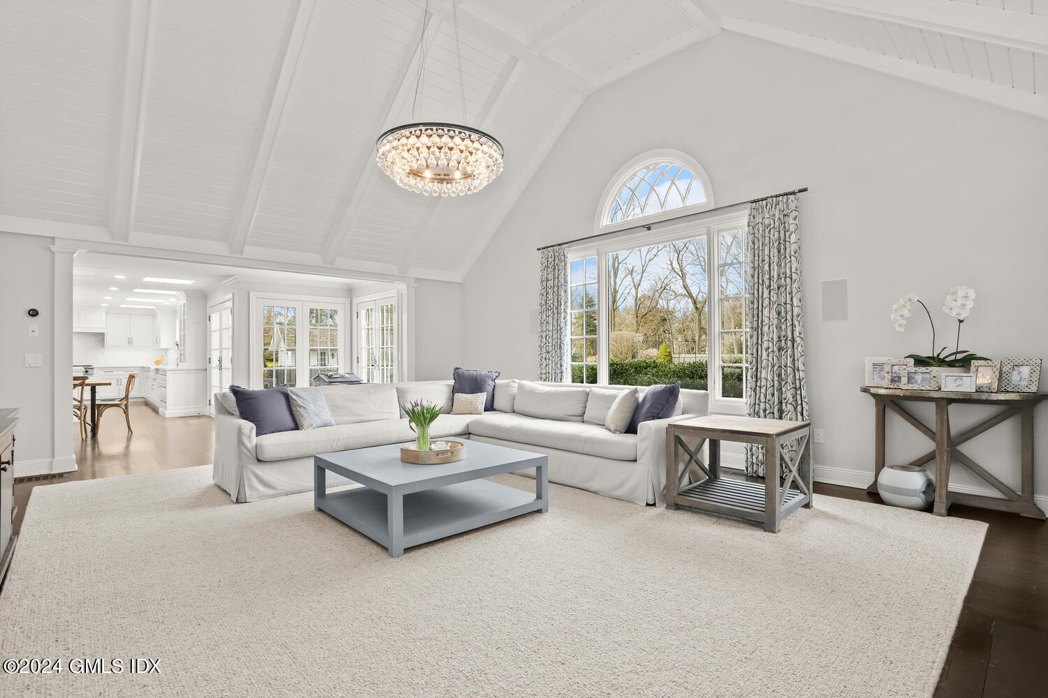 2 Lauder Way Greenwich, CT 06830 - Photo 8 of 25 a living room with furniture a table and a large window