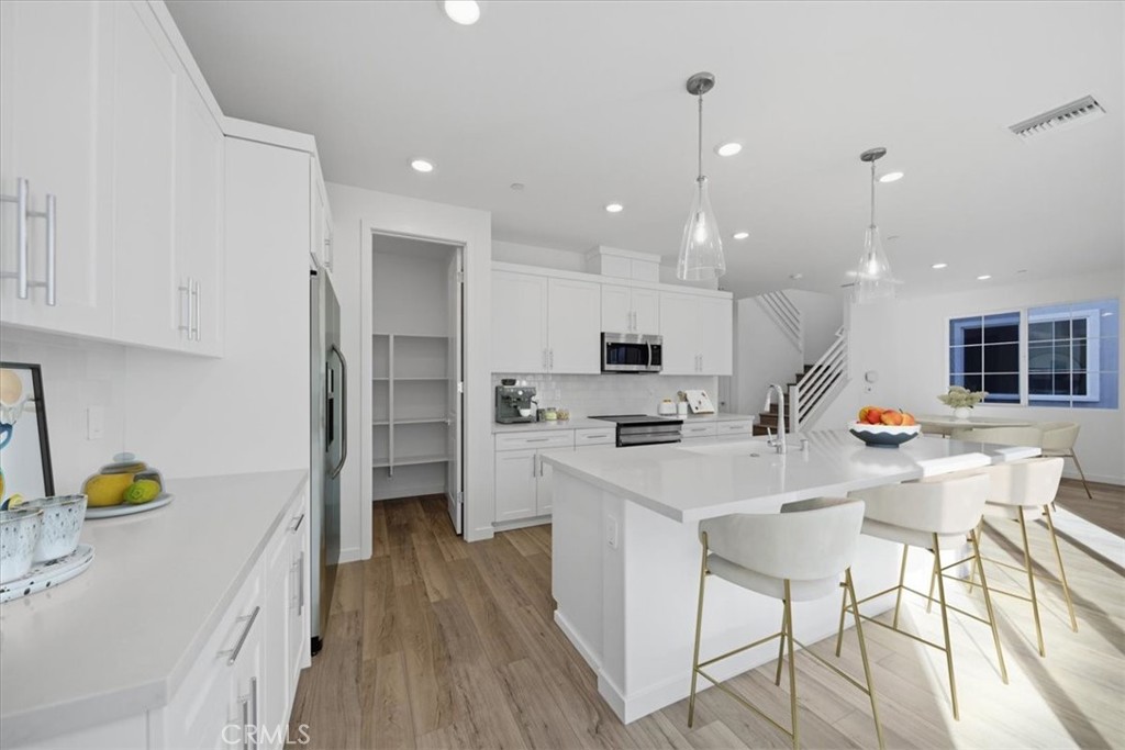 4805 Arroyo Run Moorpark, CA 93021 - Photo 7 of 28 PHOTOS ARE OF MODEL MATCH AND HAVE BEEN VIRTUALLY STAGED. INTERIOR/EXTERIOR FINISHES MAY VARY