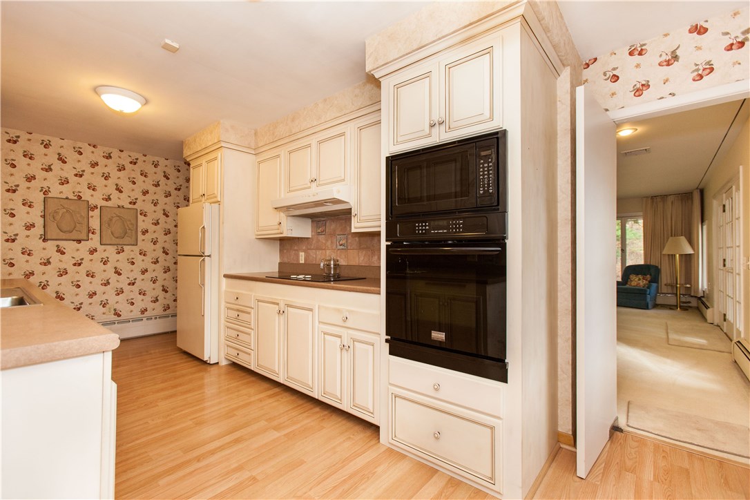 133 Forge Road North Kingstown, RI 02852 - Photo 13 of 35 Kitchen with lots of cabinets, fully applianced, hardwood floors.