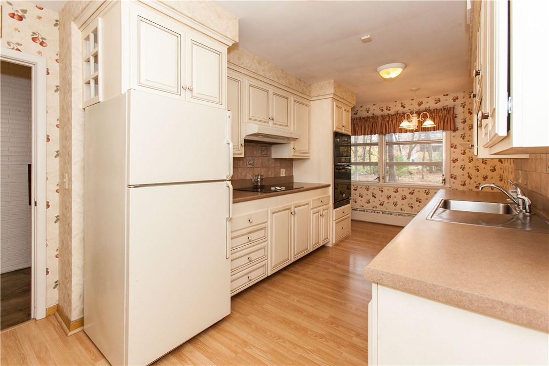 133 Forge Road North Kingstown, RI 02852 - Photo 14 of 35 Galley style kitchen off the formal dining room.