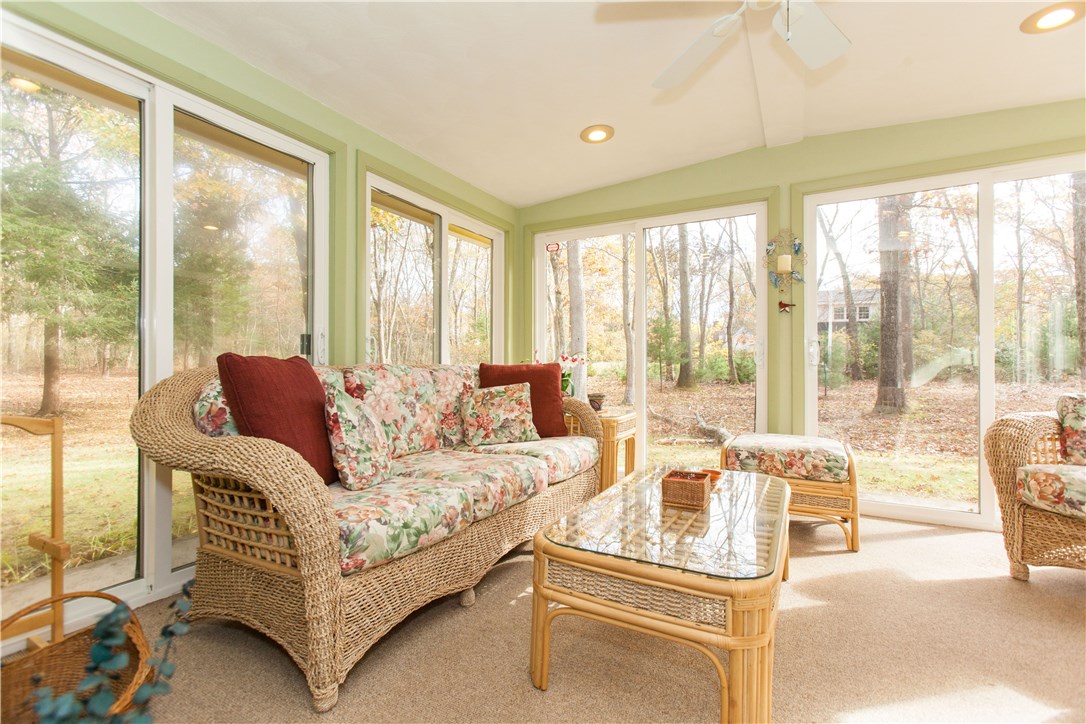 133 Forge Road North Kingstown, RI 02852 - Photo 30 of 35 Three season room with walls of glass and view of the 3+ acre grounds.