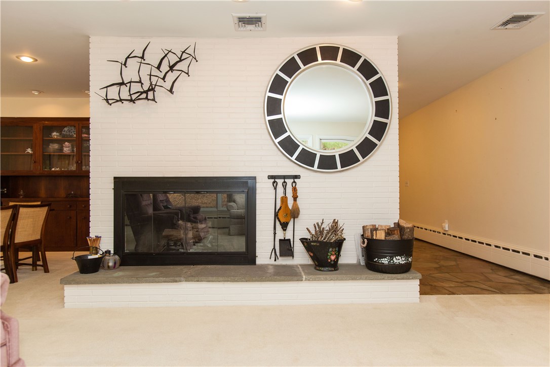 133 Forge Road North Kingstown, RI 02852 - Photo 8 of 35 Large stone fireplace with raised hearth.