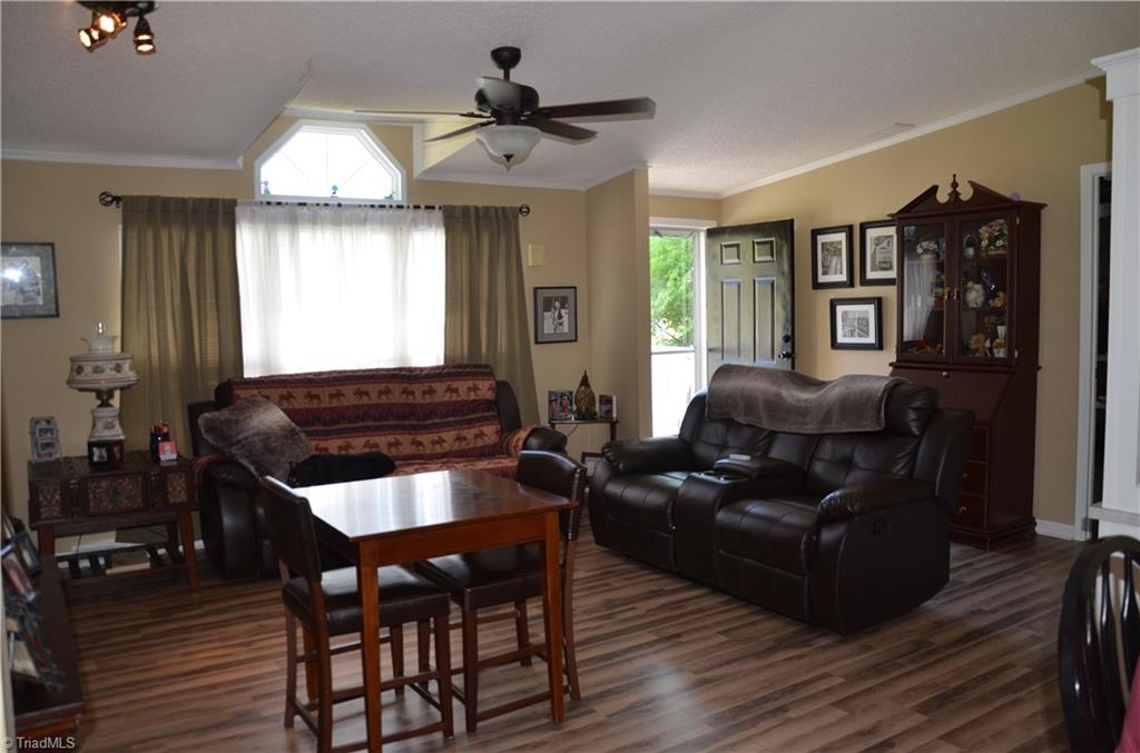 4724 Poplar Ridge Road Trinity, NC 27370 - Photo 14 of 18 Living Room is HUGE with beautiful flooring!