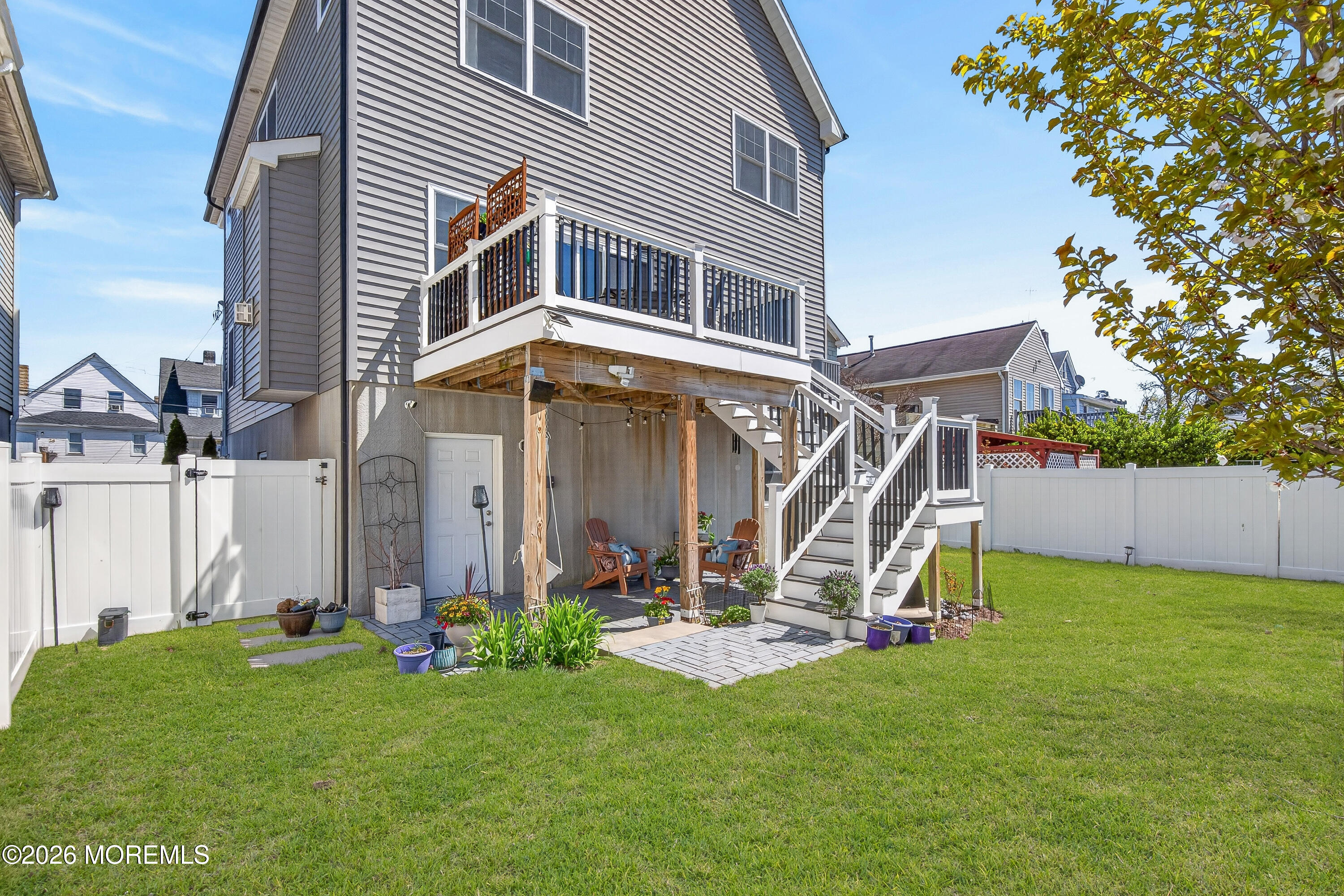 27 5th Street Highlands, NJ 07732 - Photo 61 of 62 a view of a house with a yard