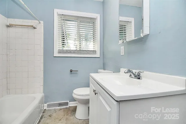 a bathroom with a sink toilet and bathtub