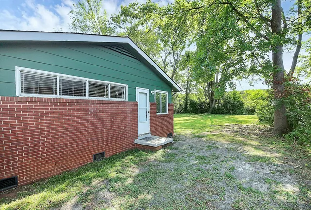 a view of a backyard with a garden