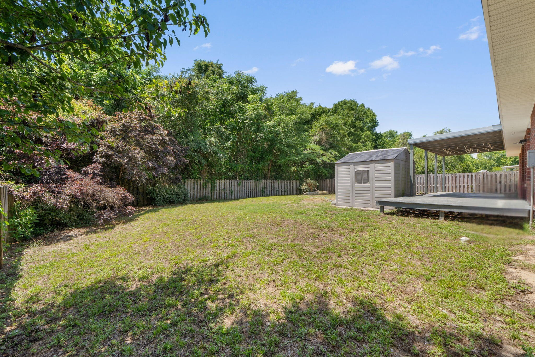 2108 Hagood Loop Crestview, FL 32536 - Photo 37 of 41 side view backyard