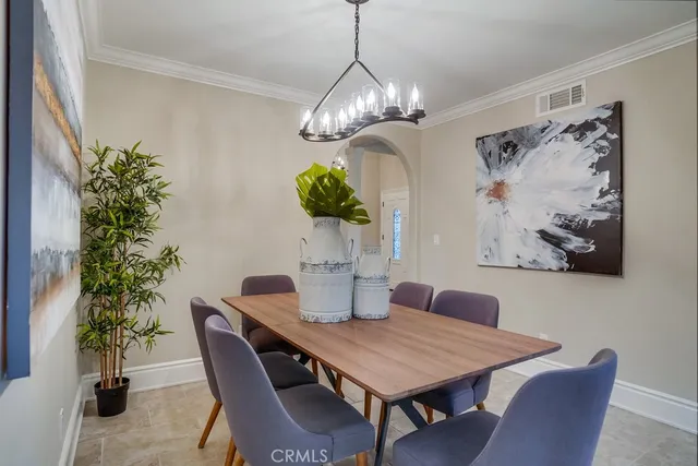 a bedroom with a bed and a mirror