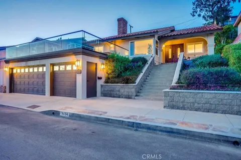a view of stairs and flowers