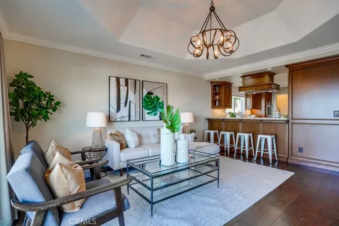 a view of a palm tree in the middle of a yard