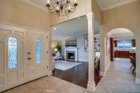 a kitchen with stainless steel appliances granite countertop wooden cabinets a stove top oven a sink and dishwasher