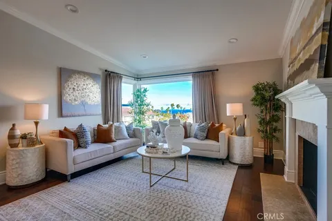 a kitchen with stainless steel appliances granite countertop a sink and a refrigerator