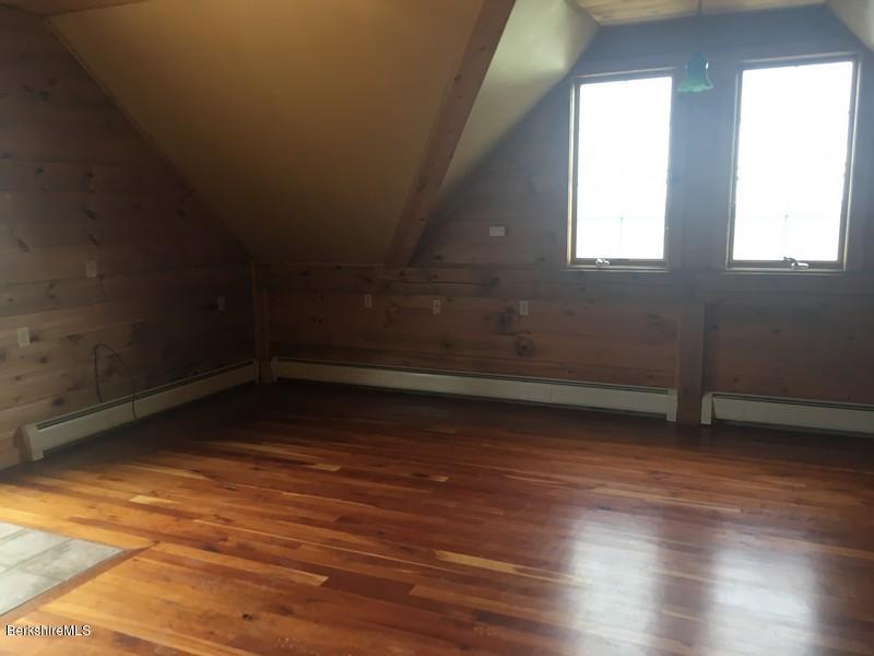 75 Hickingbotham Road Peru, MA 01235 - Photo 13 of 32 a view of a room with wooden floor and window