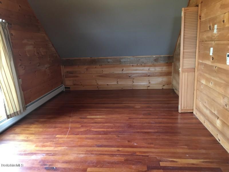 75 Hickingbotham Road Peru, MA 01235 - Photo 18 of 32 a view of room with wooden floor and window