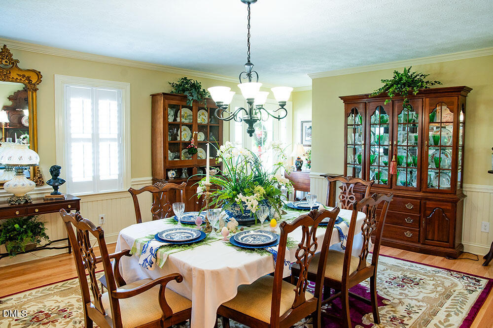 75 Frank Timberlake Road Timberlake, NC 27583 - Photo 25 of 93 a view of a dining room with furniture window and wooden floor