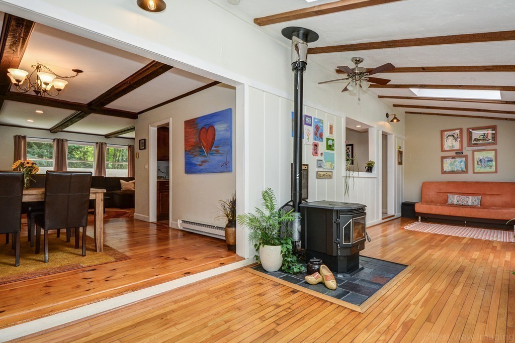 854 Great Road Stow, MA 01775 - Photo 2 of 8 a living room with furniture and wooden floor