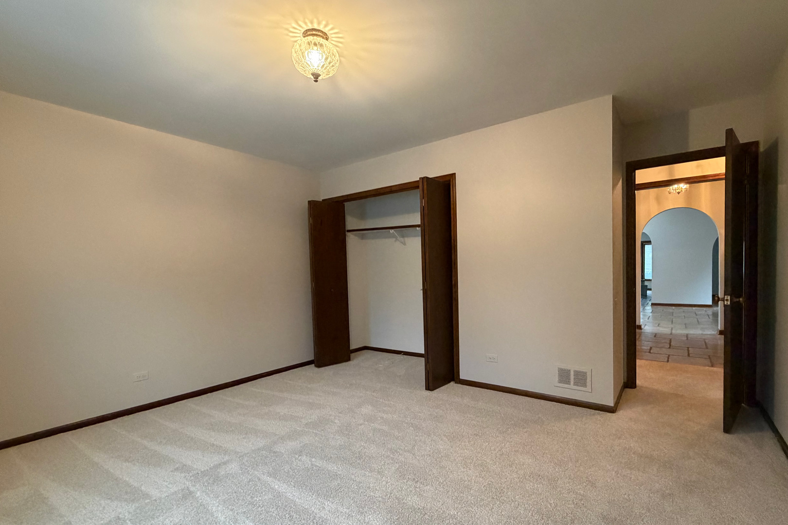 9630 Reding Circle Des Plaines, IL 60016 - Photo 14 of 30 an empty room with closet and a bathroom